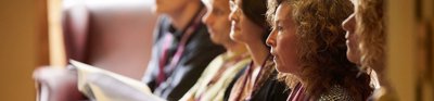 Conference delegates listening to a presentation