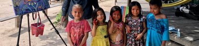 John Dyer pictured in the Amazon rainforest tribal village of Mutum in the Acre region of Brazil with children of the Yawanawá tribe