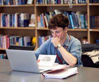 A man working at a laptop