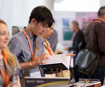 People looking at books