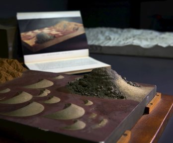 A plaster and wooden model showing sand dune formation